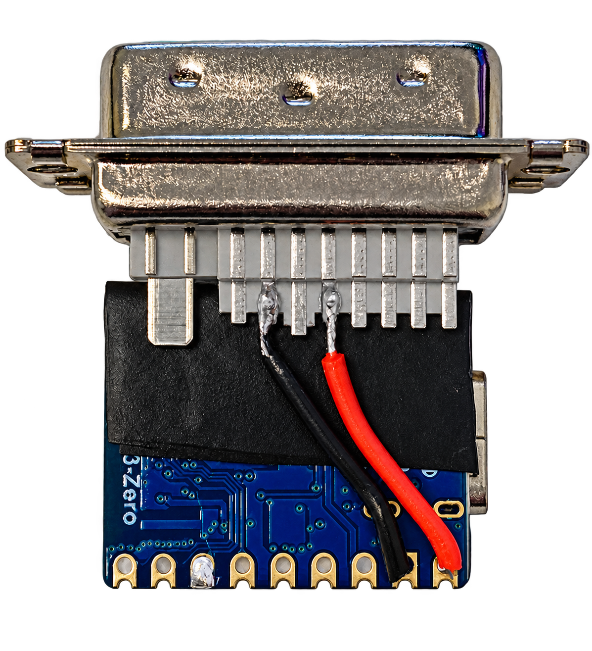 Reverse side of the same adapter, showing red switched 5 V and black ground wires.